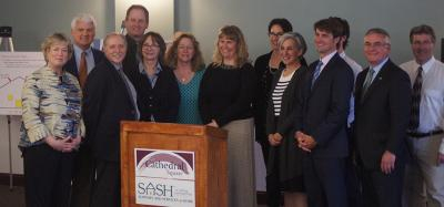 S. Carpenter (far left) and partners from Cathedral Square Corp and other agencies, 5/2/2016