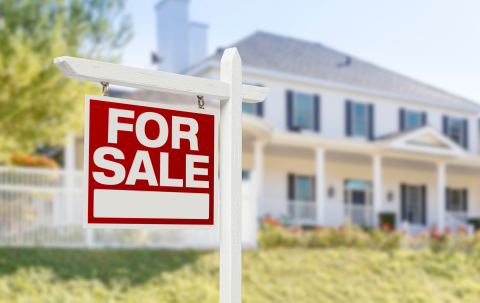 Home with for sale sign Home with for sale sign