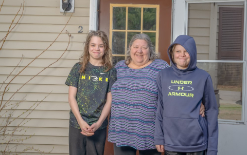 Kathleen Stanfield and her children at their home